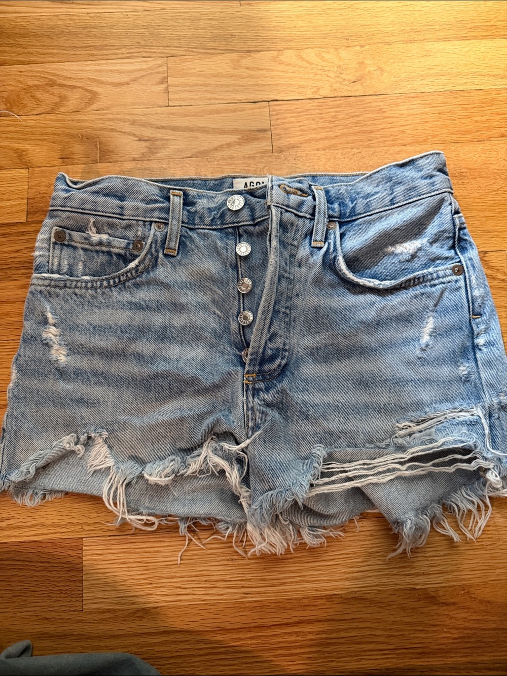 Agolde Light Wash Distressed Denim Cutoff Shorts